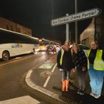 Photos of a few chauffers on the side of the road. We see their buses in the middle of the roads, hinder other motorists.